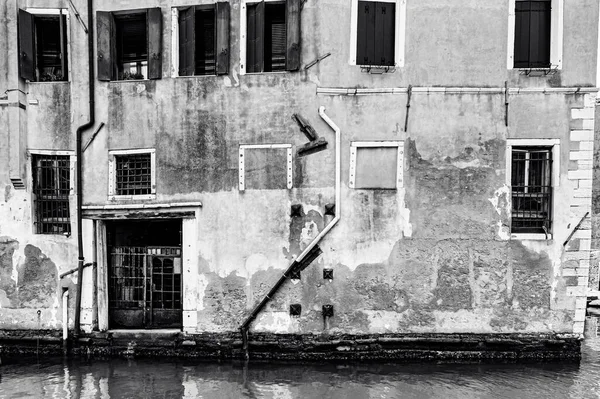 Deserted Venice in black and white. Museum City is situated across a group of islands that are separated by canals and linked by empty bridges.