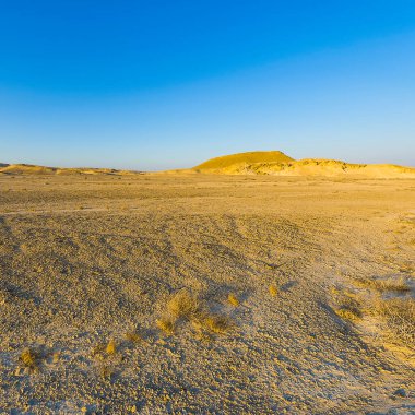 İsrail 'deki Negev Çölü' nün Rocky tepelerinin sonsuz ıssızlığı. Ortadoğu 'nun nefes kesici manzarası ve doğası.