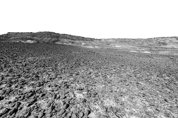 İsrail çölünde siyah beyaz kaya oluşumlarının nefes kesici manzarası. Yalnızlık, umutsuzluk ve depresyon kavramı olarak cansız ve ıssız bir sahne..