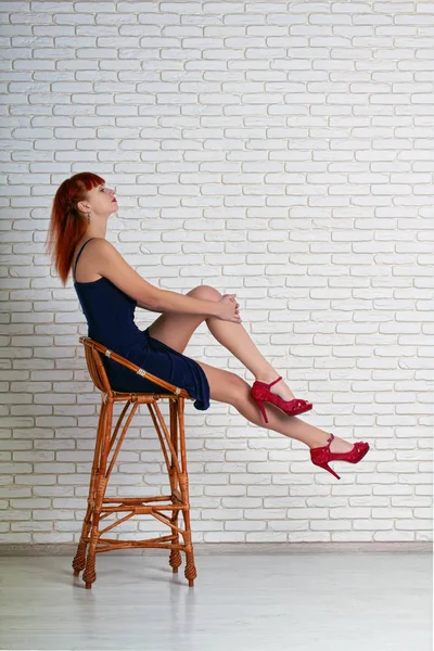 Girl in chair — Stock Photo, Image