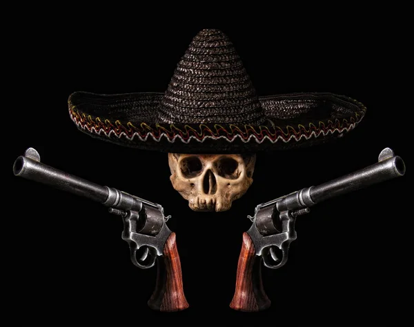 Teschio con revolver — Foto Stock
