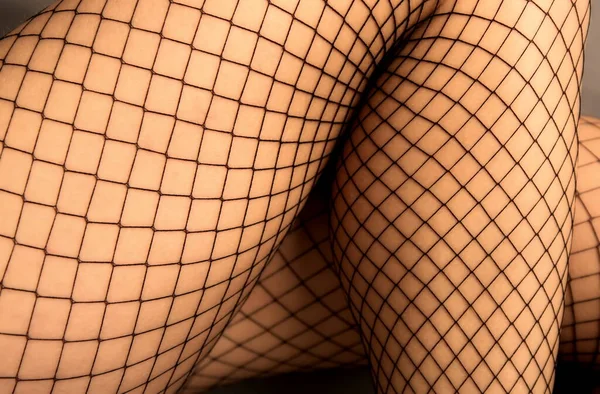 Fishnet stocking legs — Stock Photo, Image