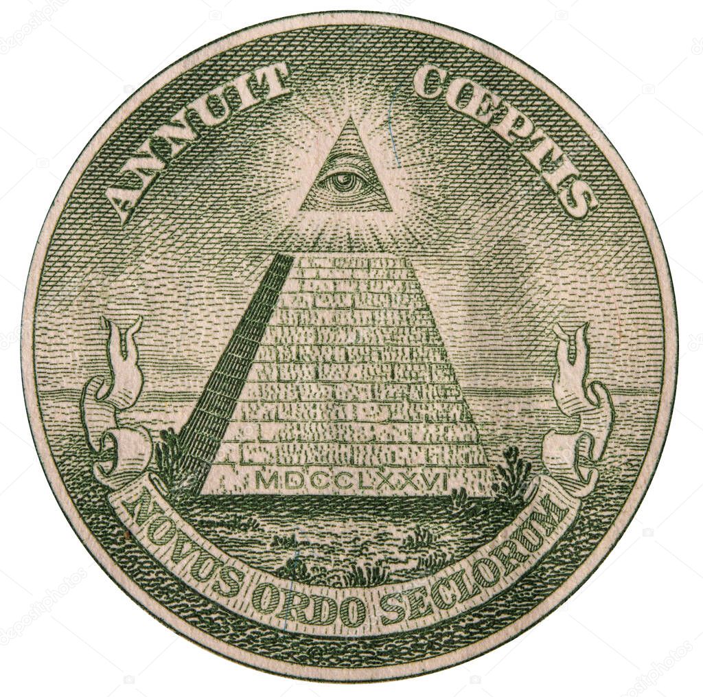 close-up of a fragment of a US bank one dollar bill with a Masonic pyramid symbol and an all-seeing eye