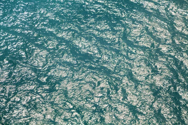 Sea surface, view from airplane — Stock Photo, Image