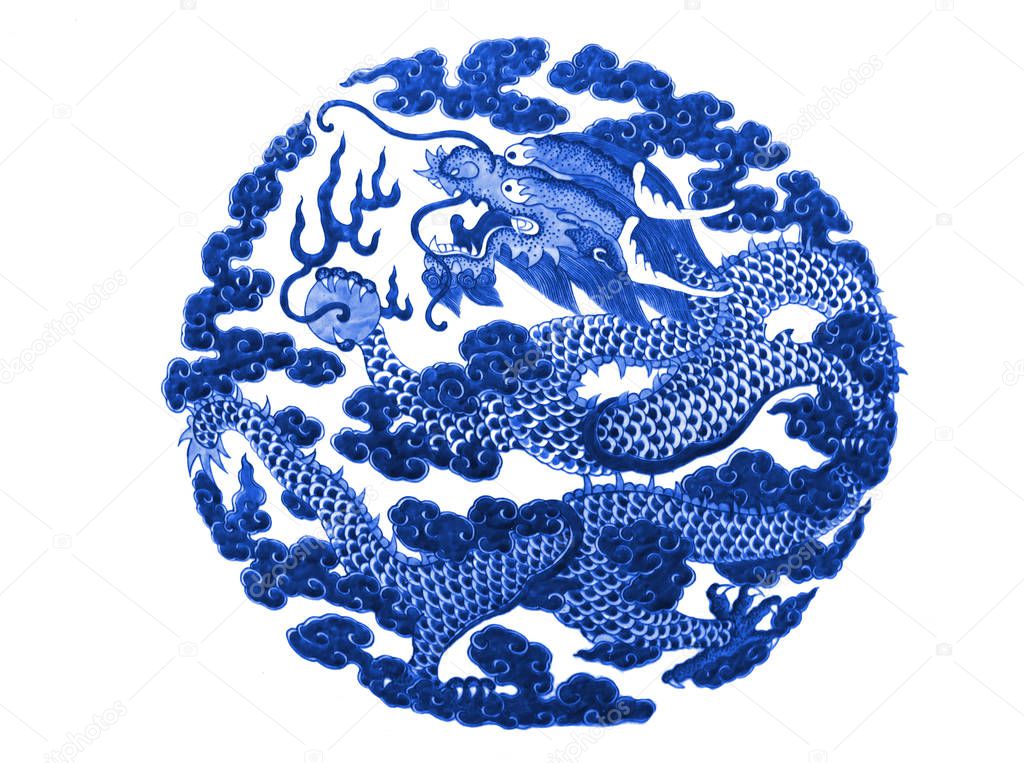 Chinese dragon painted on a ceramic vase with cobalt blue glaze