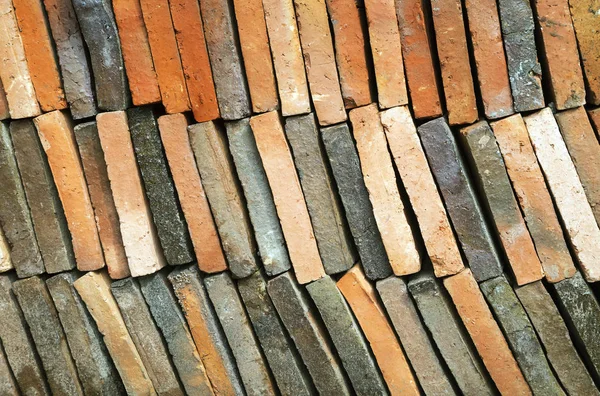 Background of old clay tiles in a pile — Stock Photo, Image