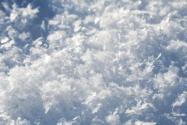 Кристаллы снега крупным планом — стоковое фото
