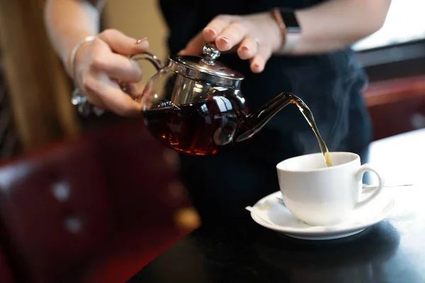 Waiter Fills Cup Tea Cafe — Stock Photo, Image