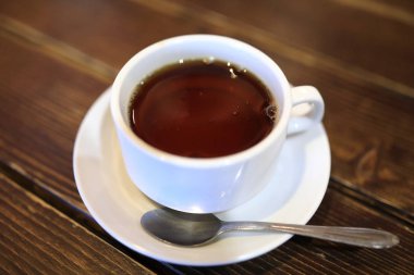 Beyaz fincan siyah çay Cafe