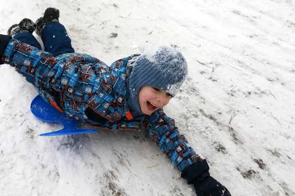 Boy Slides Board Hill Winter — Stock Photo, Image