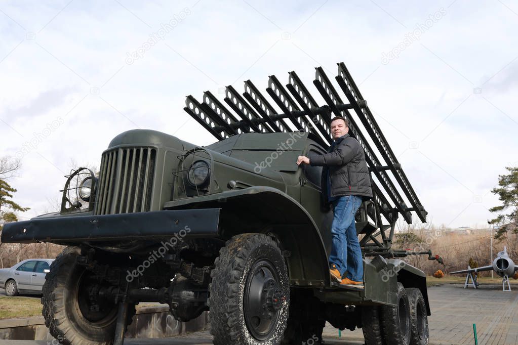 Man on soviet rocket artillery combat vehicle BM-13, Yerevan, Armenia