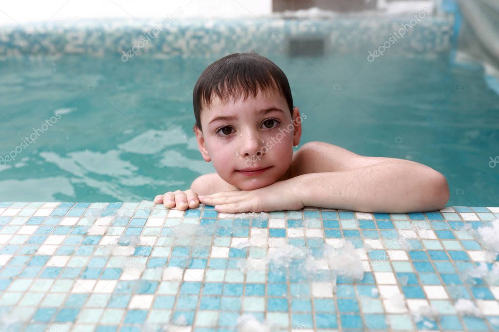 Child in winter pool