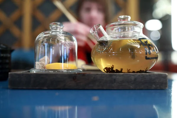 Tea in glass teapot — Stock Photo, Image