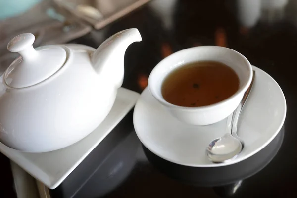 Teapot and teacup with tea — Stock Photo, Image