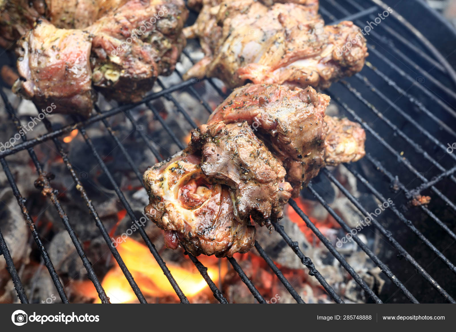 Cooking lamb on grill — Stock Photo © AChubykin 285748888