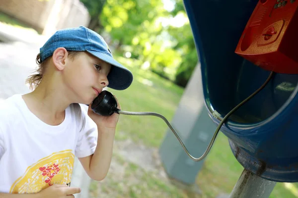 Boy talking on analog phone — Stock Photo, Image