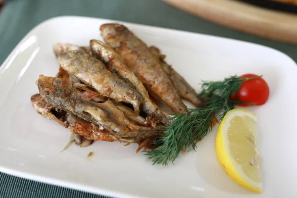 Plate with fried red mullet — Stock Photo, Image