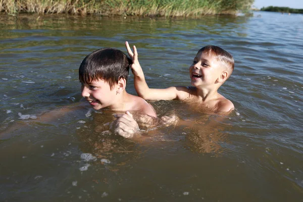 Two Boys Swimming Lake Krasnodar Region Russia Stock Picture