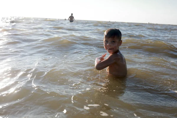 Child swimming in Sea of Azov, Russia — Stock Image Child Swimming Sea Azov Russia Stock Picture