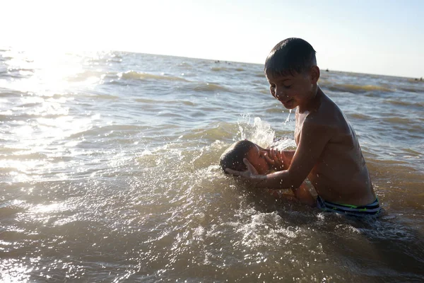 Brothers swimming in Sea of Azov, Russia — Stock Image Brothers Swimming Sea Azov Russia Stock Photo