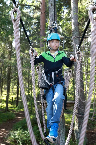 Boy Overcoming Hanging Ropes Obstacle Forest Adventure Park Karelia — Stock Photo, Image