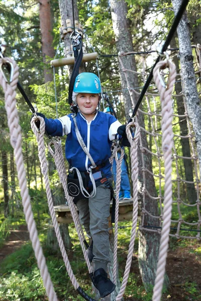 Child Overcoming Hanging Ropes Obstacle Forest Adventure Park Karelia — Stock Photo, Image