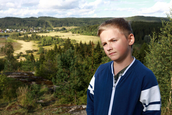 Thinking Kid On Mount Paaso in summer, Karelia