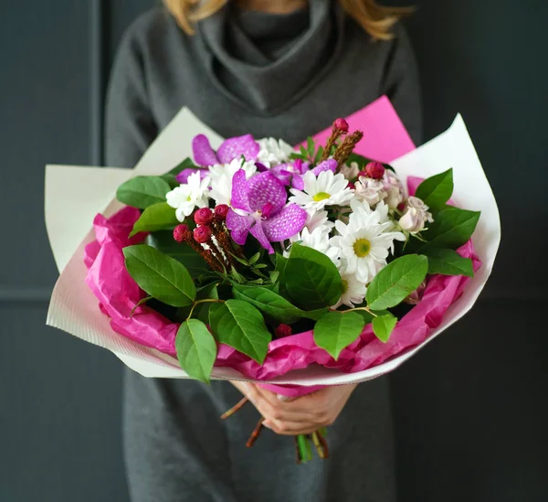 nice bouquet in the hands of woman