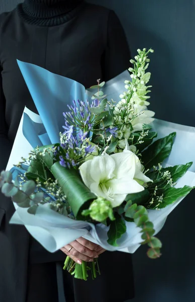 nice bouquet in the hands of woman