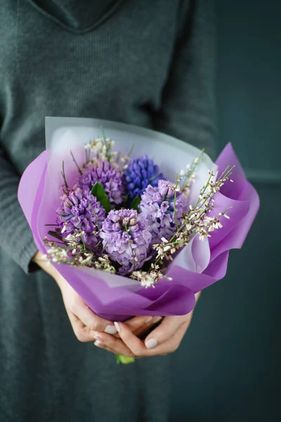 nice bouquet in the hands of woman