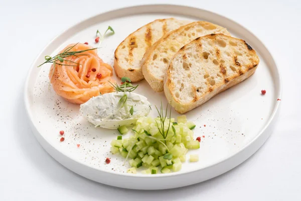 toasts with smoked salmon, close up