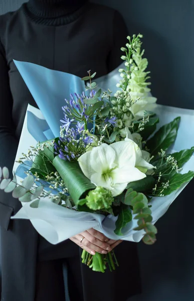 nice bouquet in the hands of woman