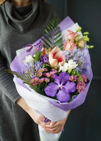 nice bouquet in the hands of woman