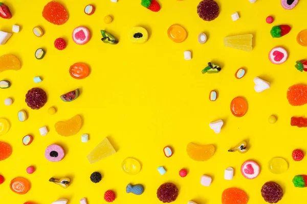Colorful Candies Yellow Background — Stock Photo, Image