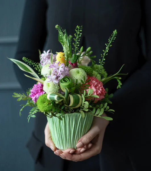 nice bouquet in the hands of woman