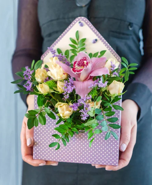 spring bouquet in the hands, close up