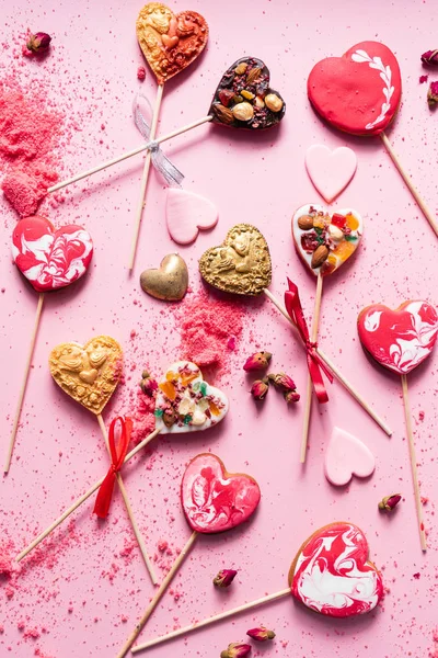 heart shaped cookie pops for Valentine\'s Day.