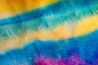 Renkli pastel, tasarımınız için örnek yüzeyi serpiştirir. Arkaplan yapısı bulanık. 