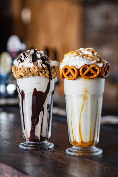 crazy milkshakes with chocolate, caramel and whipped cream