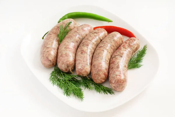 Raw Sausages Herbs White Plate — Stock Photo, Image