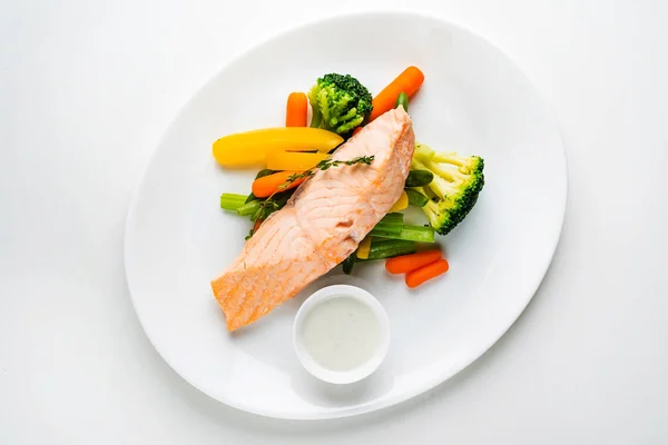 Fillet of salmon with cooked vegetables