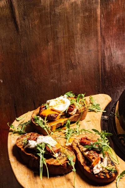 Toast Dried Tomatoes Poached Egg Arugula Leaves — Stock Photo, Image