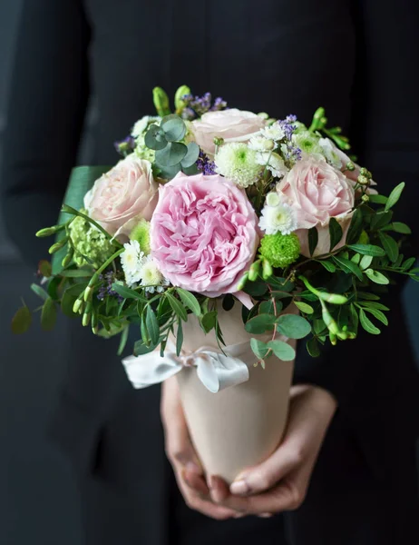 nice bouquet in the hands of woman