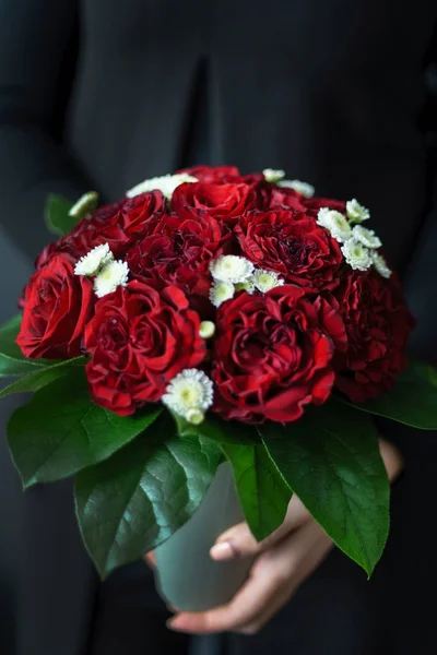 nice bouquet in the hands of woman