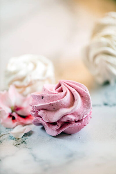 Beautiful delicious desserts. Zephyr in the shape of flowers roses. 