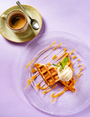 belgian waffles with ice cream and coffee, close up