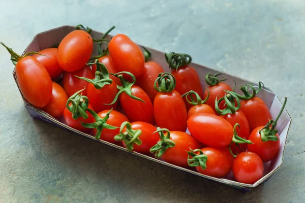 cherry tomatoes in box, close up