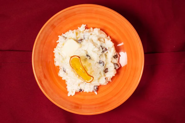 rice pudding with butter and raisins