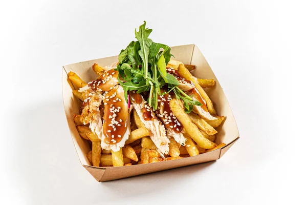 french fries with chicken and sauce
