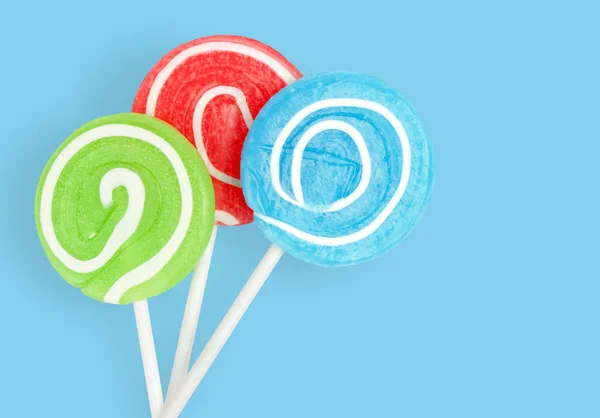 Barevné Lolli Pop Lízátko Modrém Podkladu Ořezovou Cestou — Stock fotografie